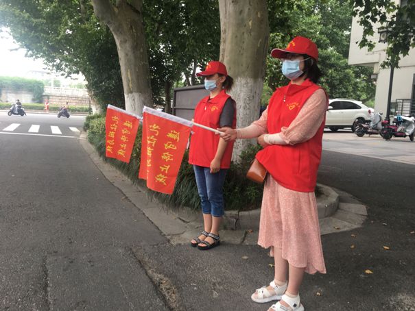 1594344025192696.jpg 2020.07.10九州(中国)志愿者开展“文明交通 志愿先行”服务活动.jpg